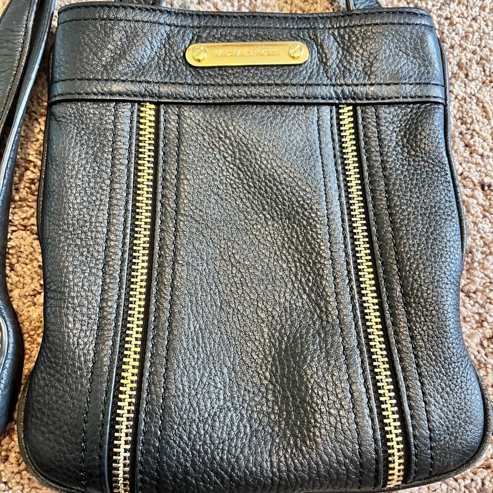 Michael Kors black leather soft pebble leather crossbody.  Size is 9”x8”